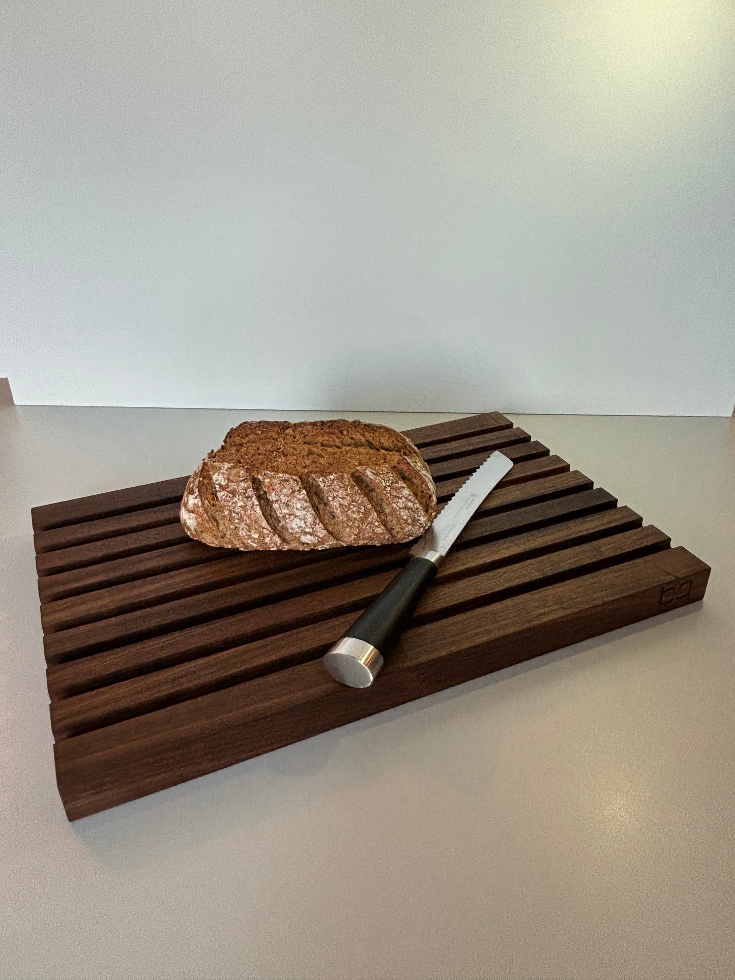 Brotschneidebrett Nussbaum